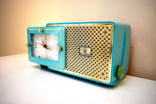 Load image into Gallery viewer, Egyptian Turquoise Gold Mid Century 1959 Bulova Model 120 Tube AM Clock Radio Excellent Condition!